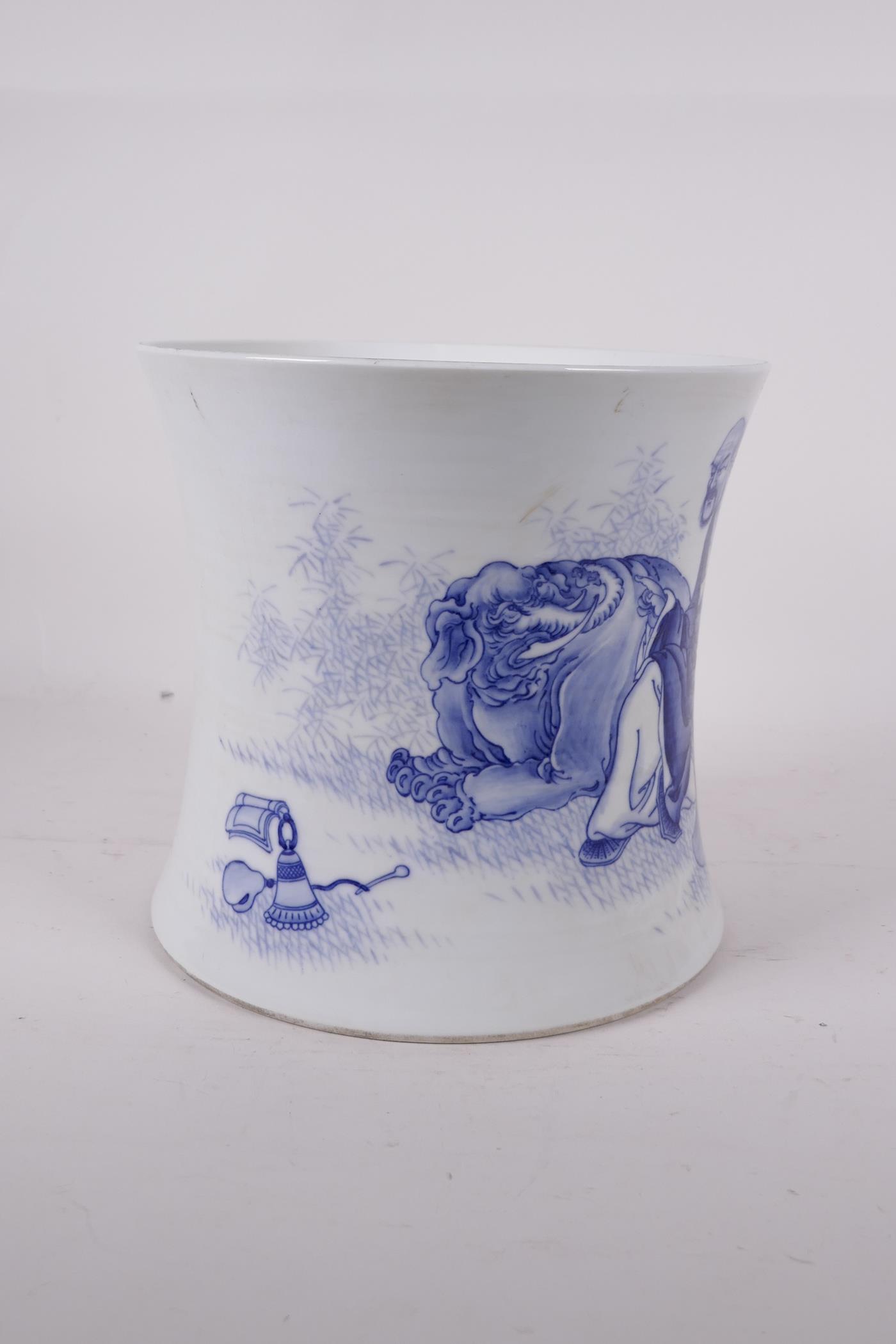 A Chinese blue and white porcelain waisted brush pot, decorated with Lohan and an elephant, - Image 2 of 6