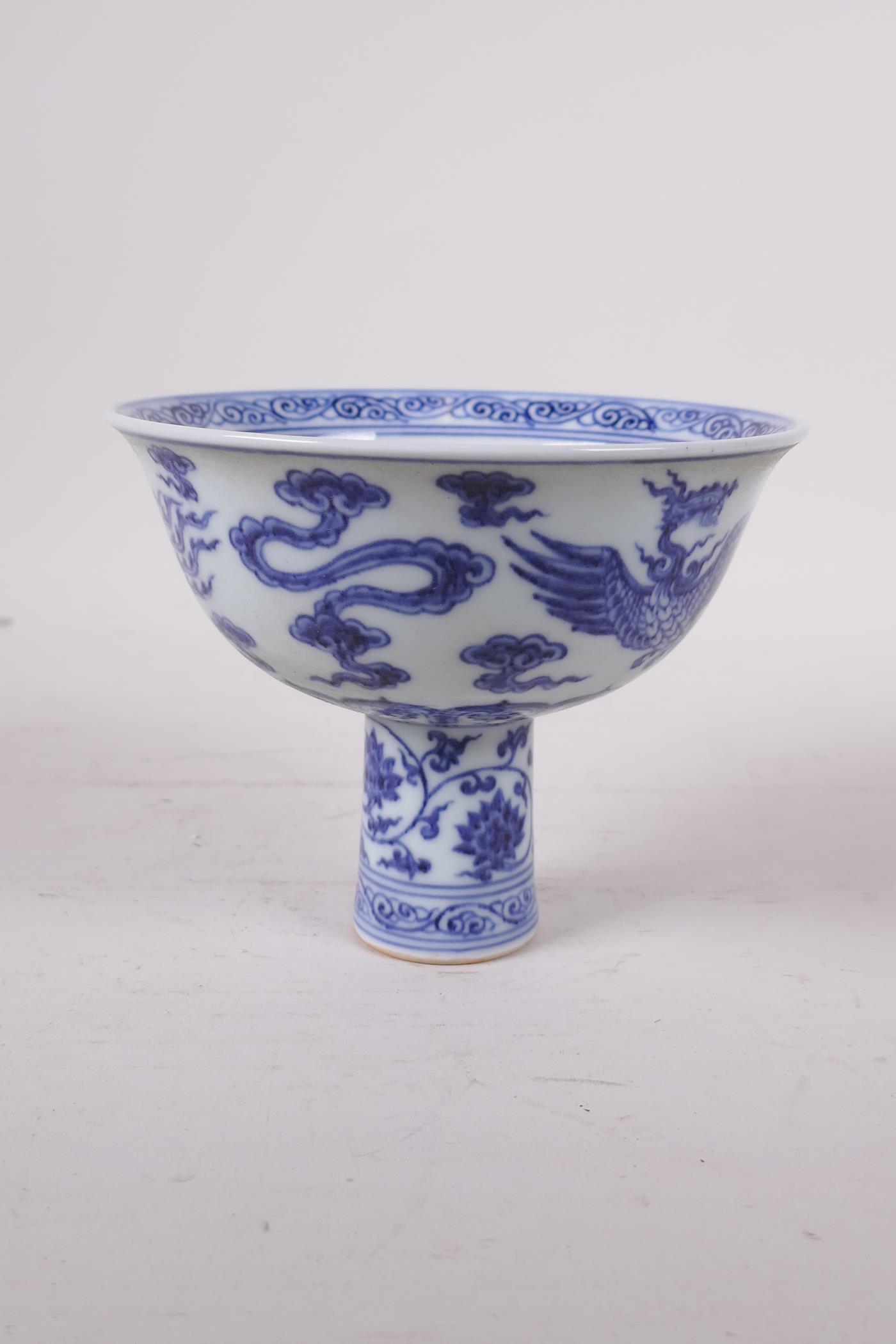 A Ming style blue and white porcelain stem bowl with phoenix decoration, Chinese, 4" high x 5" - Image 4 of 5