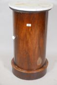 A mid C19th rosewood pot cupboard with single door and marble top, 29" high, 16" diameter