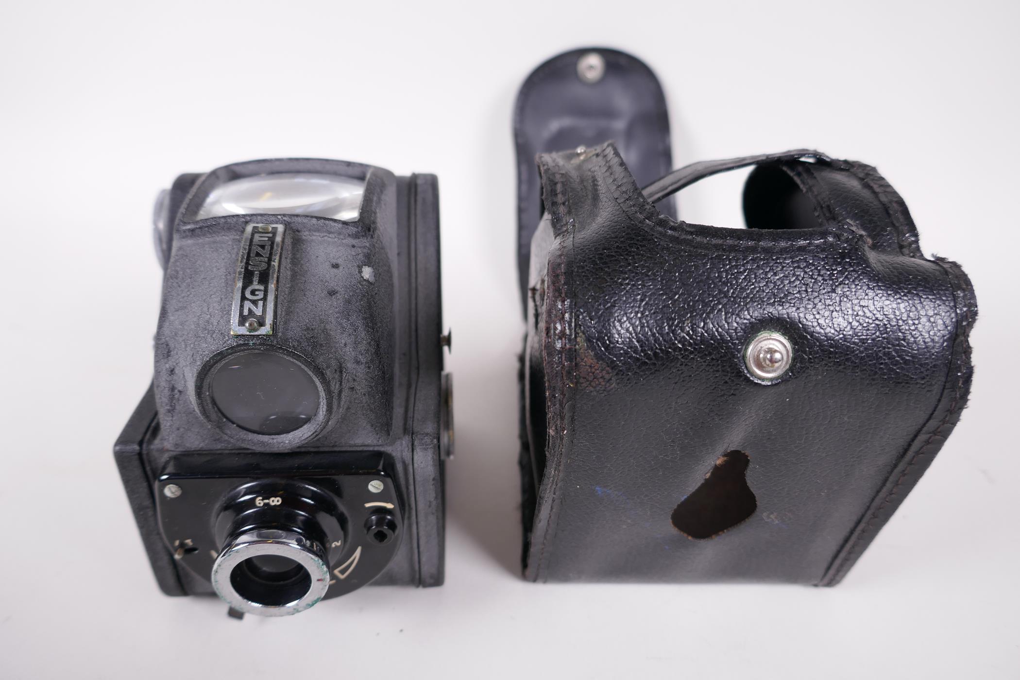 A vintage Ensign Ful-Vue camera and case, 4" high