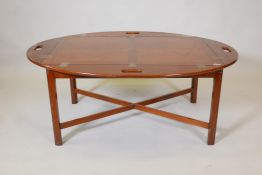 A Georgian style mahogany butler's tray with fold up flaps complete with separate stand, 48" x 35"