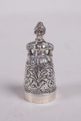 A sterling silver thimble and pincushion in the form of a lady, 1½" high