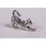 A sterling silver figure of a cat, 1" long