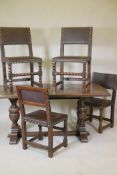 Oak refectory table with plank top, raised on carved baluster end supports united by a stretcher,