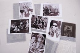 A collection of photographic transparencies of punk rockers together with later black and white