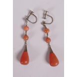 A pair of vintage gilt metal and coral drop earrings, 1" drop