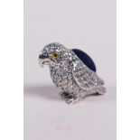 A miniature sterling silver pincushion in the form of a parrot, 1" high