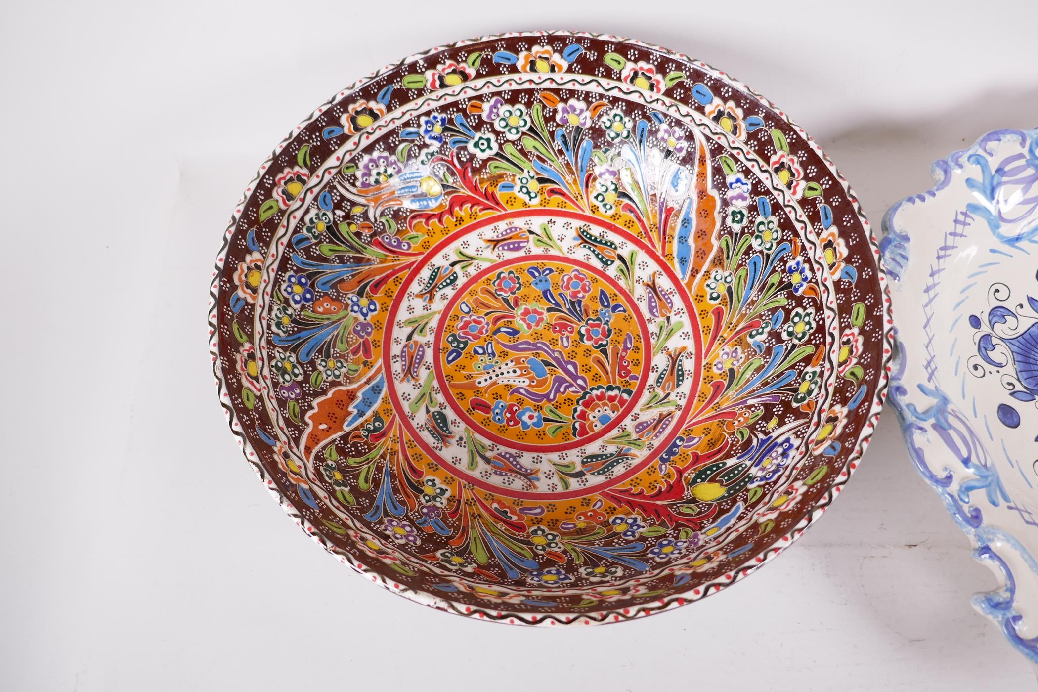A brightly coloured hand painted bowl in the manner of Thune, 12" diameter, together with an Italian - Image 3 of 4