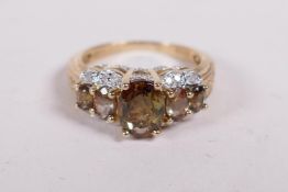 A 10ct yellow gold ring set with tourmaline and diamonds, approx size P