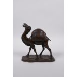 A Chinese bronze censer and cover in the form of a camel with a removable saddle, 4 character mark