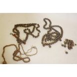 A string of vintage Tibetan Rudraksha beads, 60" long, and three other strings, one A/F