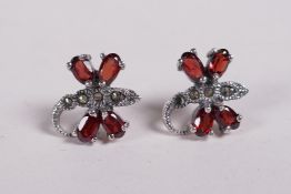 A pair of silver dragonfly earrings set with garnets and marcasite