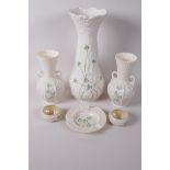 A quantity of Beleek porcelain to include a vase with flared rim, 10" high, a pair of two handled