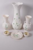 A quantity of Beleek porcelain to include a vase with flared rim, 10" high, a pair of two handled