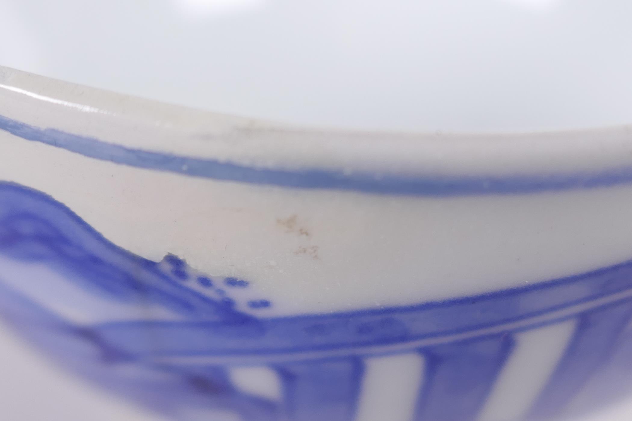 A Chinese blue and white porcelain tea bowl decorated with a figure in a continuous landscape, 6 - Image 4 of 6