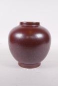 A Chinese copper lustre glazed porcelain vase, six character mark to base, 6" high