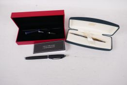 A boxed Ferrari fountain pen with refil, together with a boxed Cross ball point pen