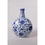 A blue and white porcelain flask with scrolling floral decoration, six character mark to side,