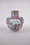 A Chinese millefiori enamel porcelain vase with elephant mask handles, seal mark to base, 5" high