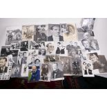 A collection of vintage photographs featuring figures from theatre, film and sport, many signed