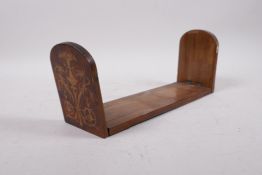 A mid C19th inlaid walnut bookslide, losses to veneer, 17½" long extended