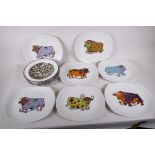 A set of seven Beefeater Steak and Grill plates decorated with stylised bulls, together with a set