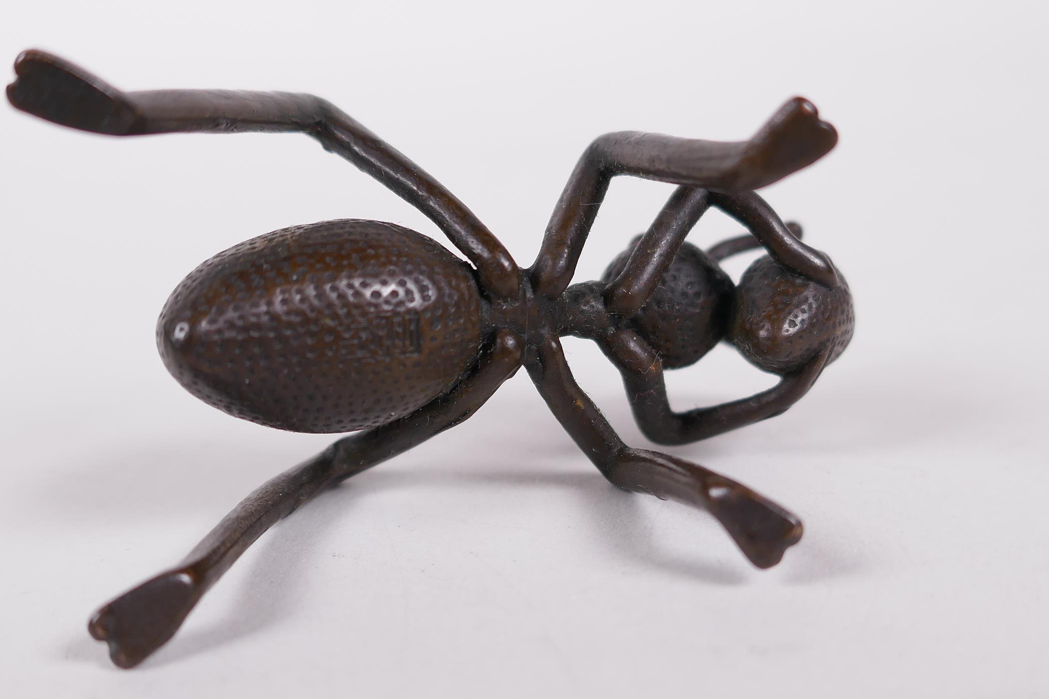 A Japanese Jizai style bronze incense stick holder in the form of an ant, 2" long - Image 3 of 3