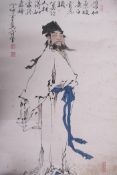 A Japanese watercolour of a bearded gentleman, detailed with calligraphy and red seal marks,