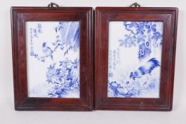 A pair of Chinese blue and white porcelain panels decorated with a chicken and bird, mounted in