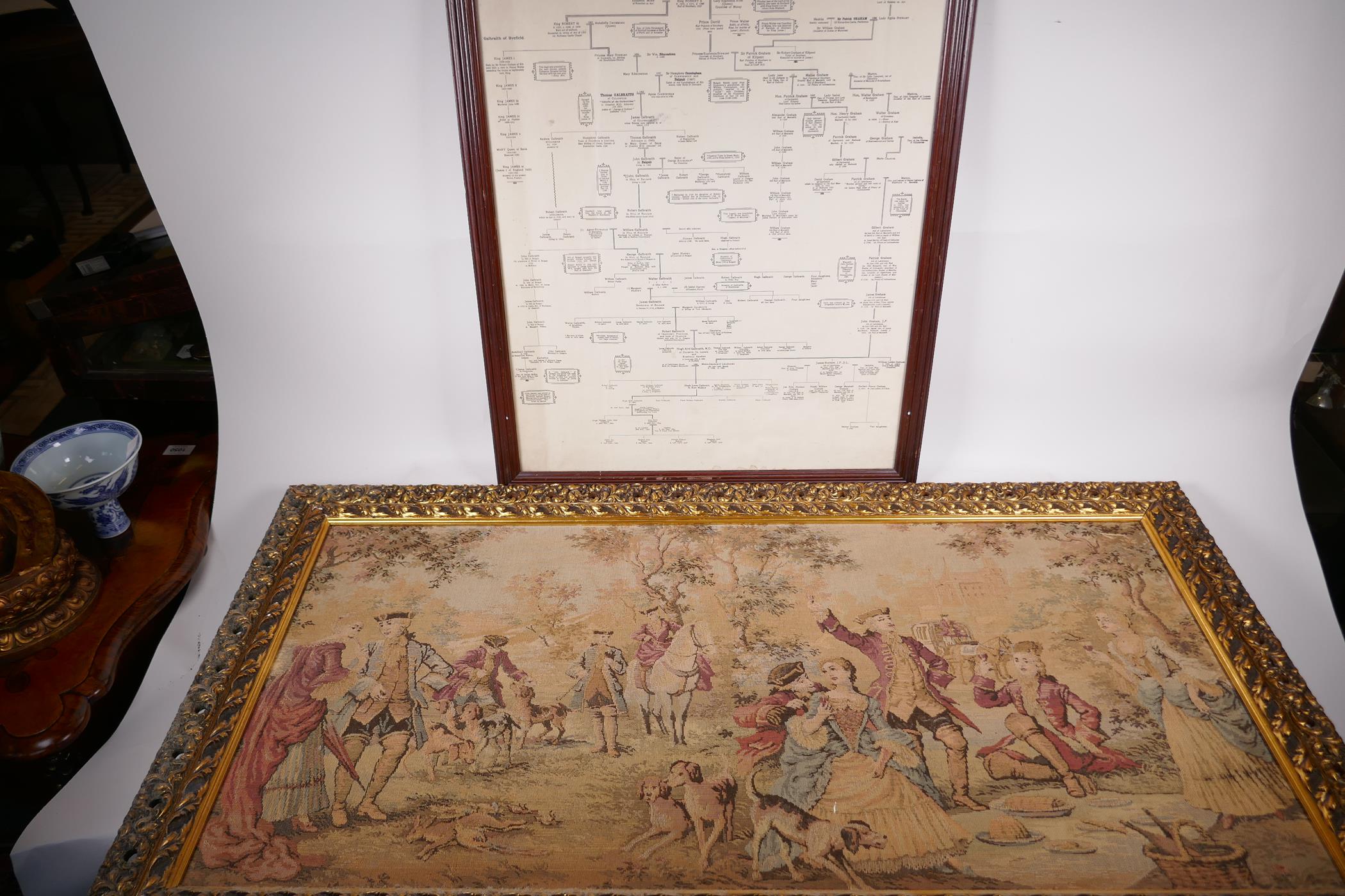 A machine tapestry of huntsmen and romantic figures, 38" x 17", together with a framed chart showing