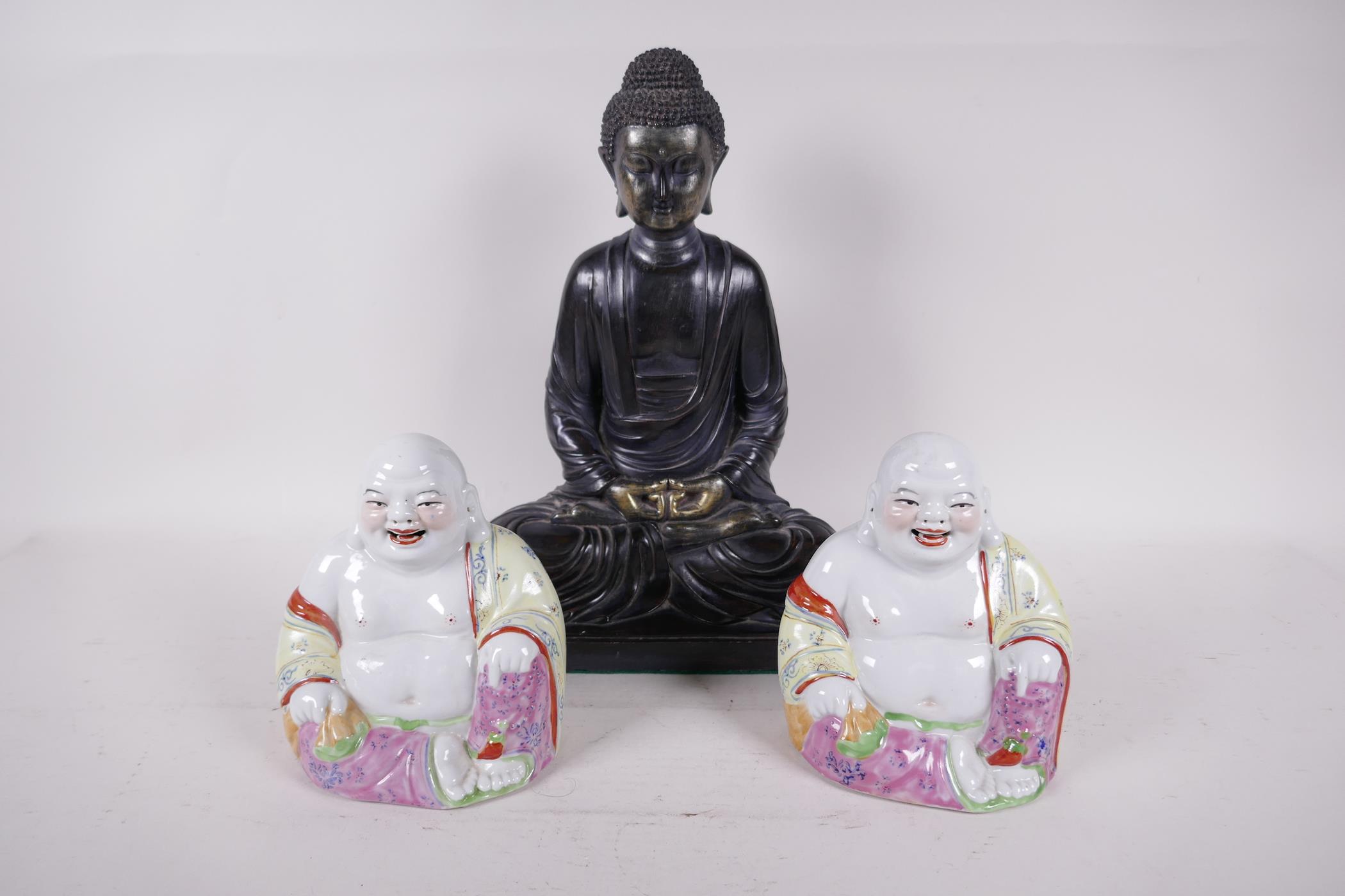 Two Chinese brightly painted figures of Buddha, 5" high, together with a composition figure of