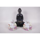 Two Chinese brightly painted figures of Buddha, 5" high, together with a composition figure of