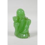 A Chinese apple green glass figure of Shao Lao, 3½" high