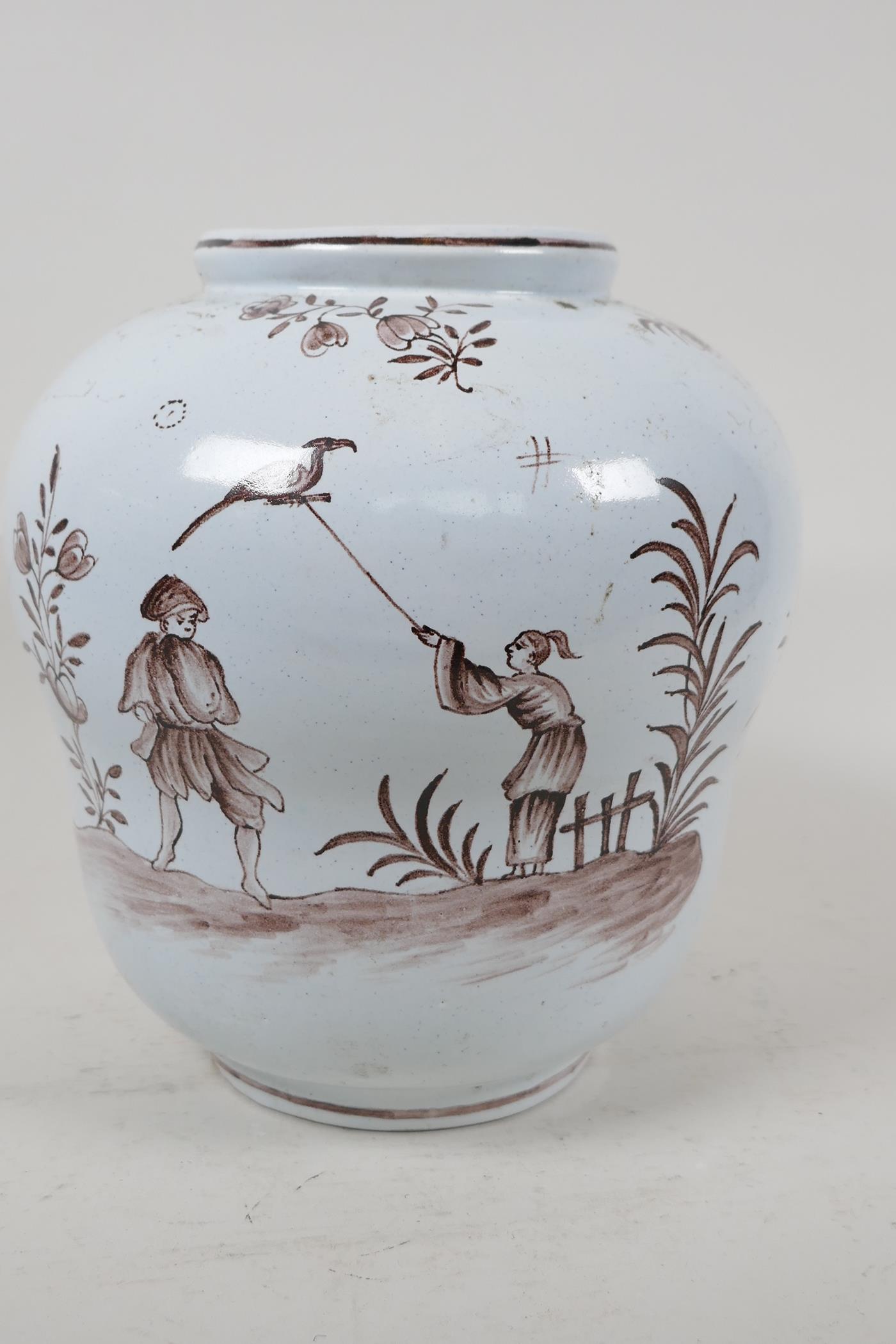 A C19th Delftware pottery vase painted with oriental figures in a garden, 8" high - Image 2 of 4