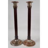 A pair of ribbed column wood and plated metal candlesticks, 16" high