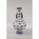 A Chinese blue and white porcelain vase with polychrome enamel butterfly decoration, Qianlong seal