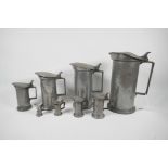 A set of eight C19th French pewter measures by Bazire, 21ltr to 1centilitre, largest 10" high