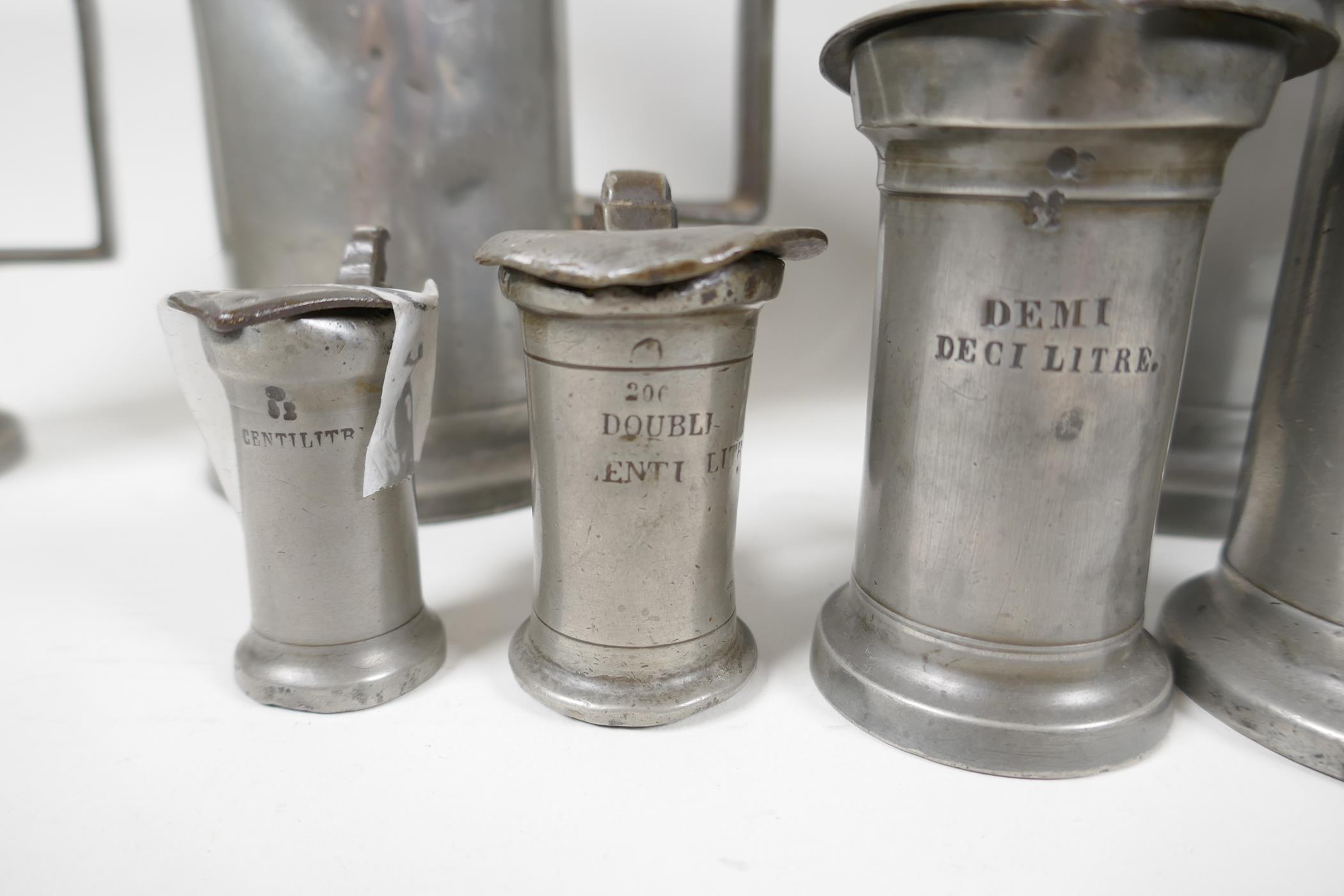 A set of eight C19th French pewter measures by Bazire, 21ltr to 1centilitre, largest 10" high - Image 2 of 5