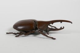 A Japanese bronze Jizai style Hercules beetle, 4½" long