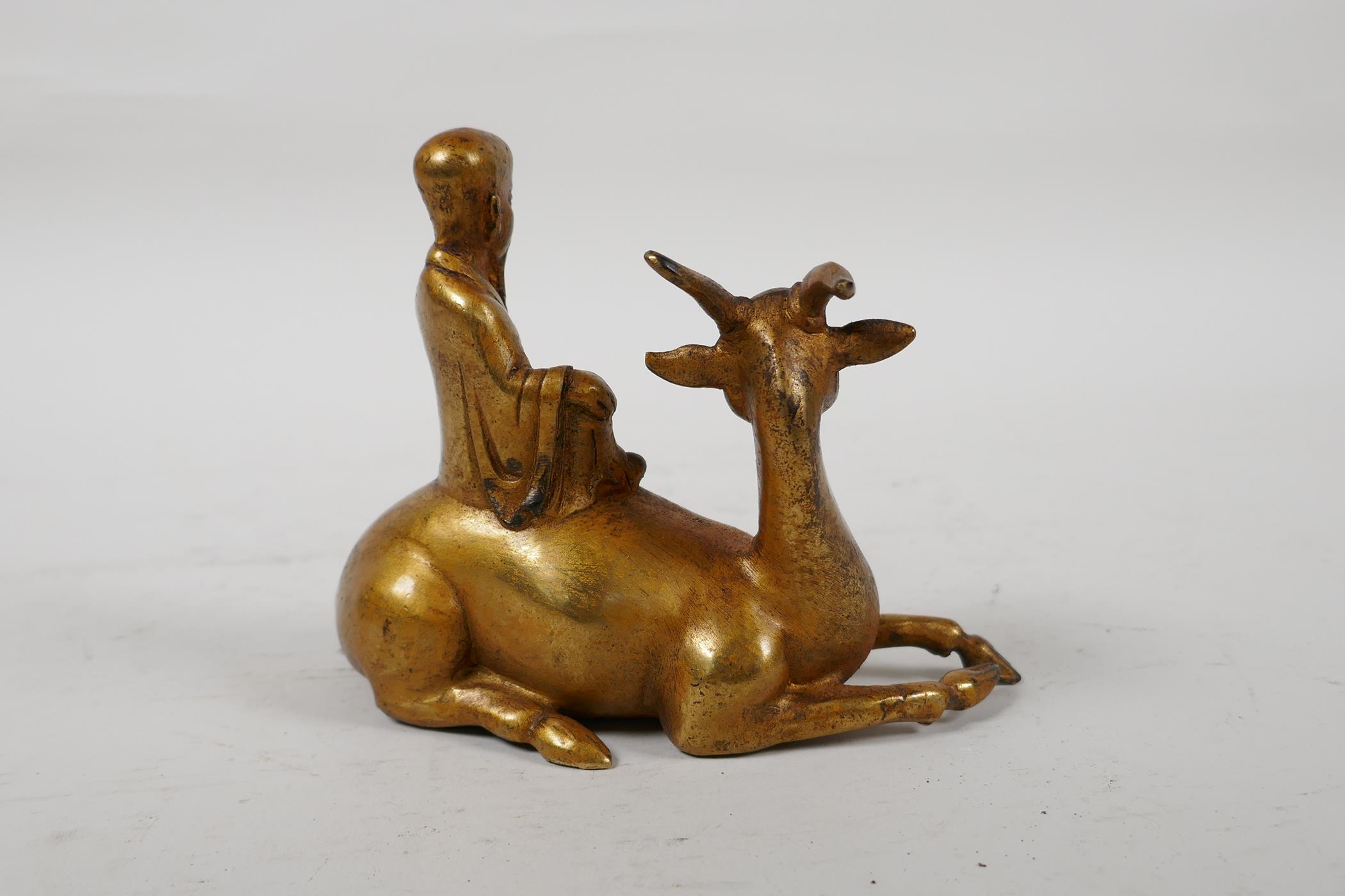 A Chinese gilt bronze of Shao Lao riding a deer, 5" long, 4" high - Image 4 of 5