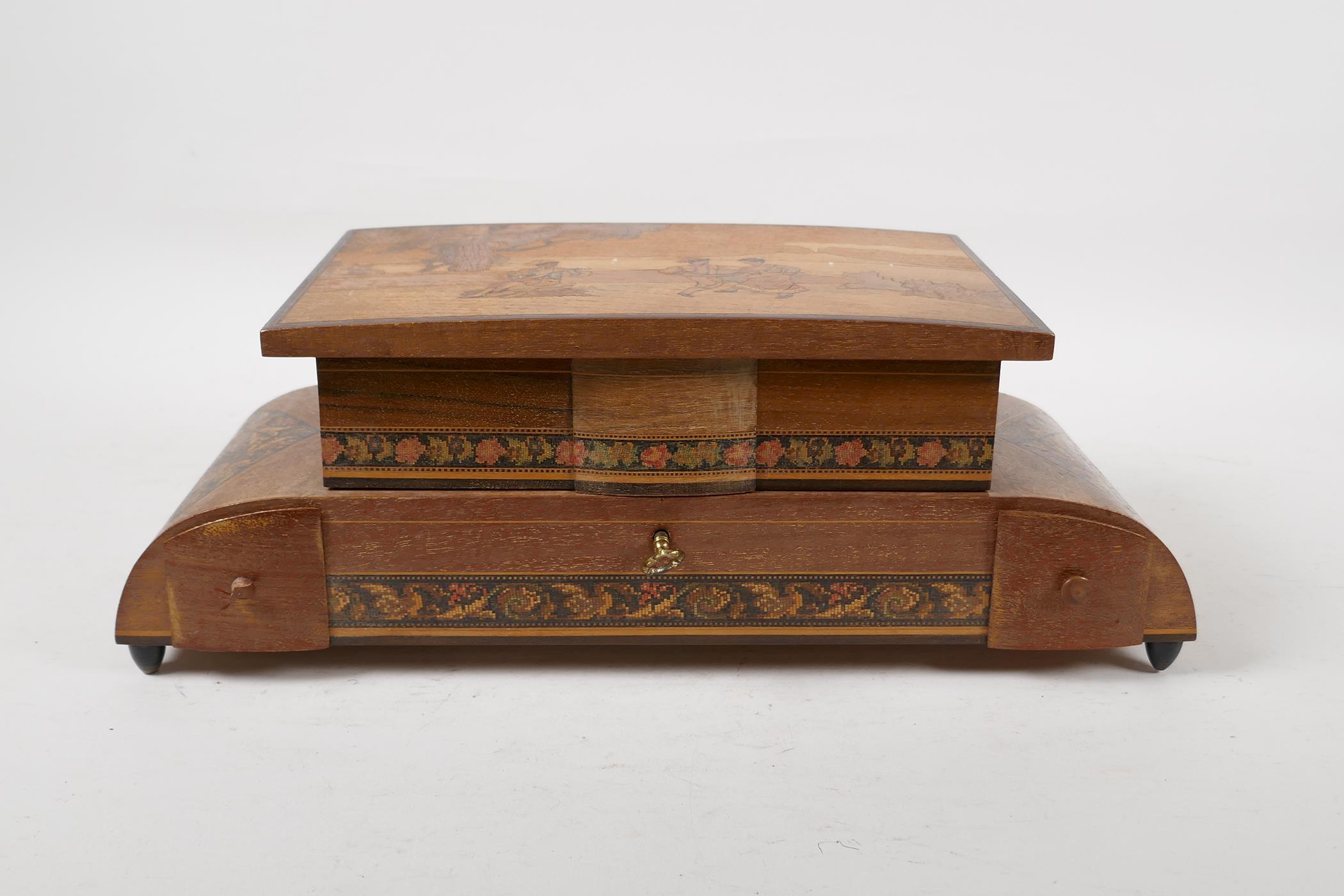 A Sorrento ware musical jewellery box, the marquetry cover decorated with a view across the Bay of