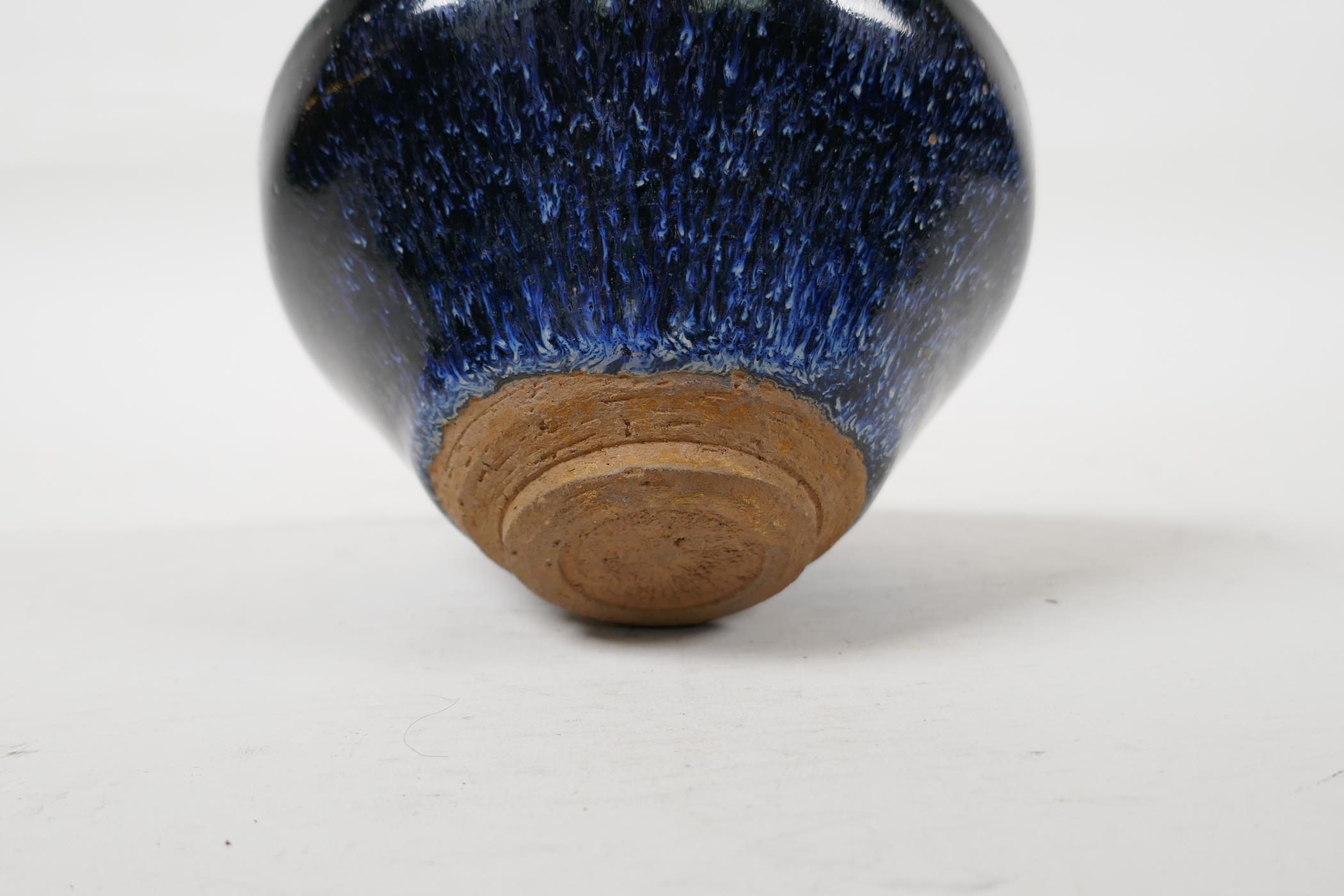 A Jian kiln pottery rice bowl with a black and blue glaze, Chinese, 5" diameter - Image 5 of 5