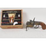 A Dunhill Tinder Pistol table lighter (losses), a Cogetama cigar box with four true and five dummy