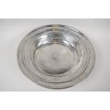 A C19th French polished pewter bowl with spun rim, 13" diameter