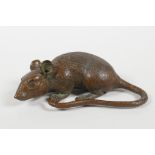 A Japanese bronze Jizai style rat, impressed mark to base, 3½" long