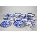 An early C19th blue and white pottery leaf dish, 6½" long, together with a collection of C19th