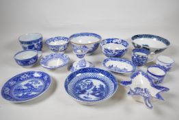 An early C19th blue and white pottery leaf dish, 6½" long, together with a collection of C19th