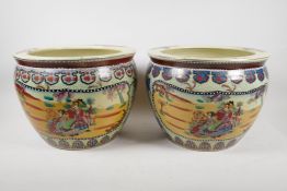 A pair of Japanese pottery goldfish bowls, with decorative panels depicting travelling geisha, and