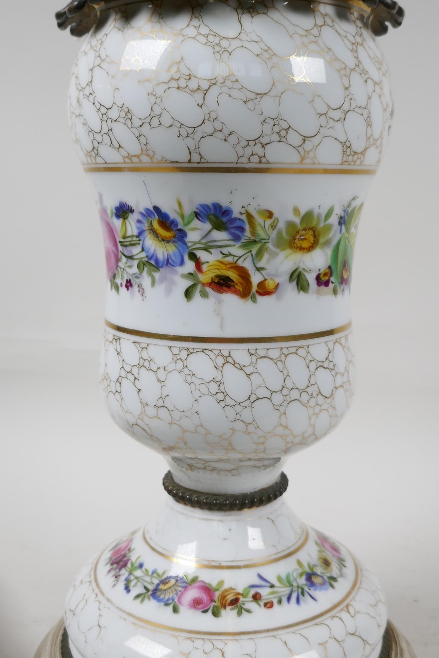 An urn shaped porcelain table lamp with ormolu mounts and painted with garlands of flowers, on a - Image 3 of 3