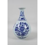 A Ming style blue and white porcelain pear shaped vase with floral spray decoration, Chinese six